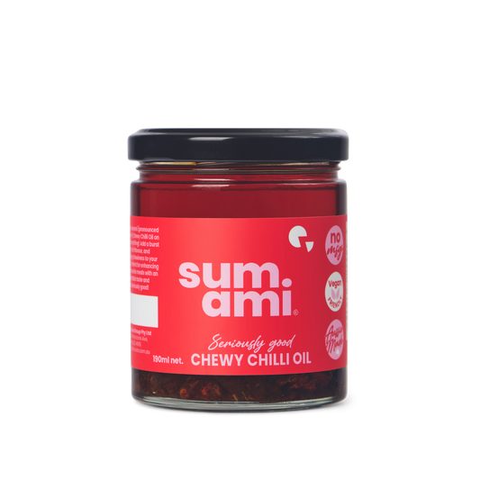 Front view of Sumami Chewy Chilli Oil bottle highlighting unique chewy texture and rich flavor for enhancing dishes.